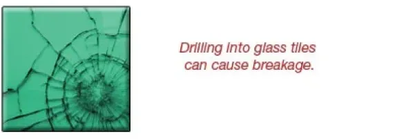 Image of a cracked glass tile with a warning about drilling, illustrating the risks associated with custom glass products like shower doors, table tops, and mirrors.