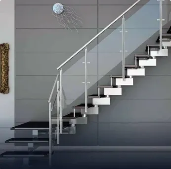Modern staircase with tempered glass railings and custom glass steps, showcasing sleek design elements that highlight custom glass solutions.