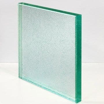 Tempered glass panel with a beveled edge, suitable for custom applications in shower doors, table tops, and mirrors.