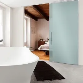 Modern bathroom featuring a sleek frosted glass shower door, elegant freestanding bathtub, and a contemporary design, highlighting custom glass solutions like tempered glass and beveled glass edges.