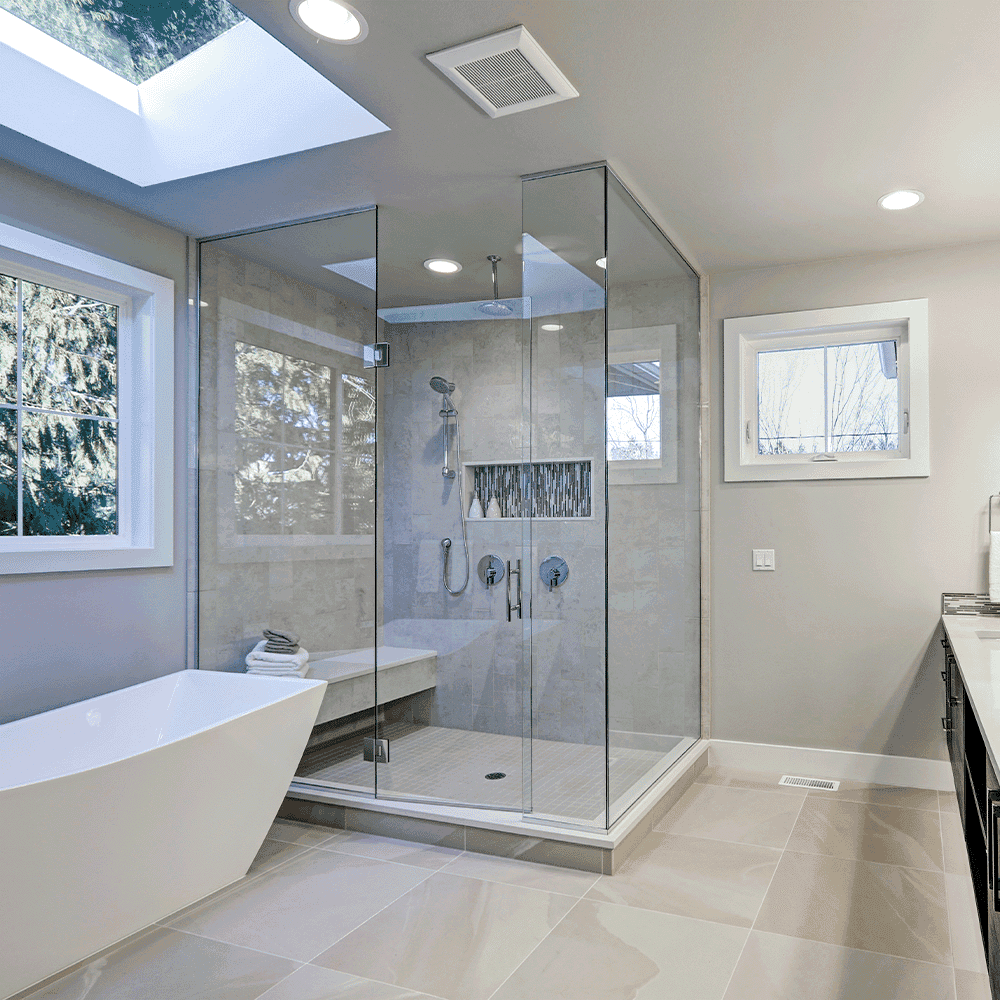 Modern bathroom featuring custom glass shower doors