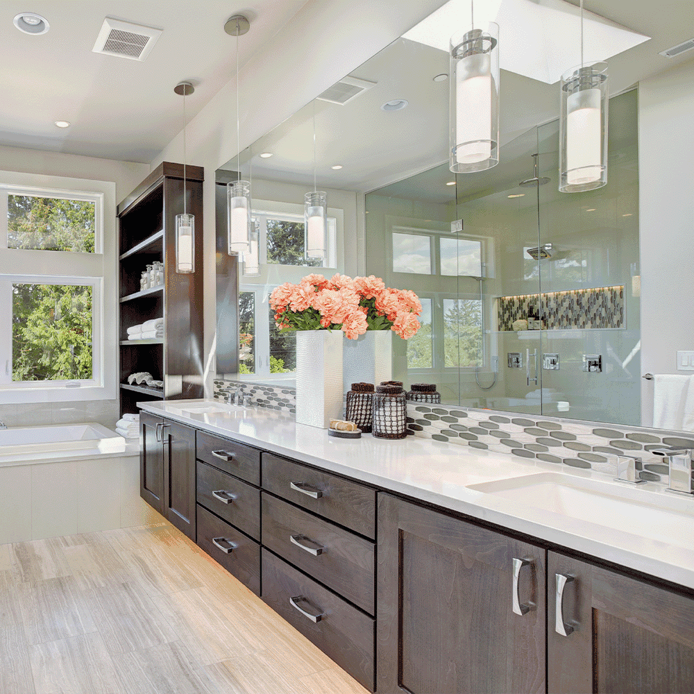 Modern bathroom featuring custom mirrors