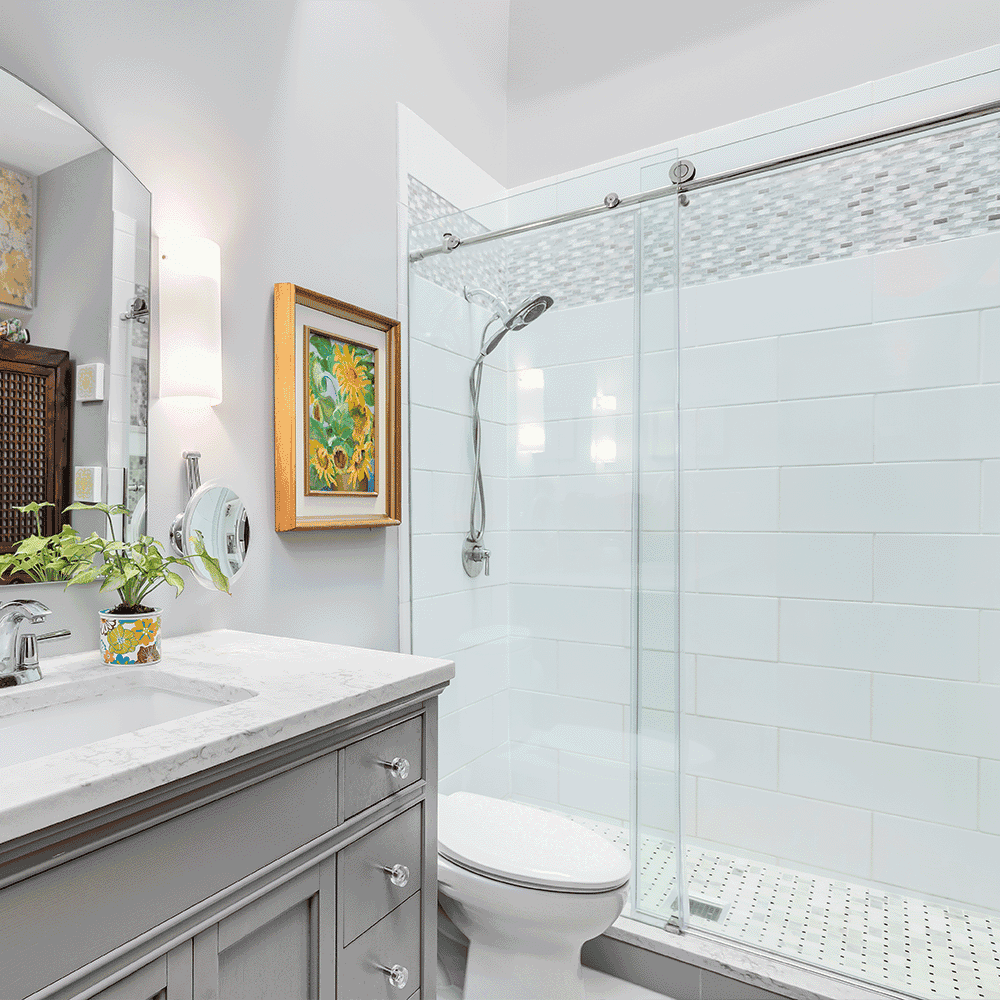 Modern bathroom featuring custom shower doors